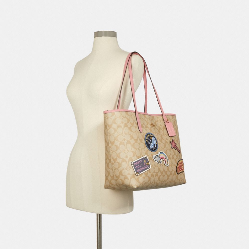 COACH® Outlet  Disney X Coach City Tote In Signature Canvas With Patches