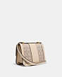 COACH®,ALIE SHOULDER BAG 18 IN SIGNATURE JACQUARD WITH SNAKESKIN DETAIL,Medium,Brass/Stone Ivory,Angle View
