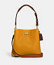 COACH®,WILLOW BUCKET BAG IN COLORBLOCK,Pebble Leather,Medium,Brass/Buttercup Multi,Front View