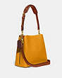 COACH®,WILLOW BUCKET BAG IN COLORBLOCK,Pebble Leather,Medium,Brass/Buttercup Multi,Angle View
