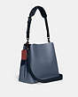 COACH®,WILLOW BUCKET BAG IN COLORBLOCK,Refined Pebble Leather,Medium,Pewter/Washed Chambray Multi,Angle View