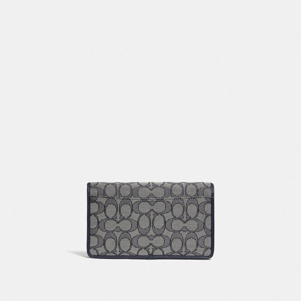 Pochette porté-croisé Hayden en jacquard Signature