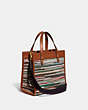 COACH®,FIELD TOTE 22 IN UPWOVEN LEATHER,Leather,Medium,Brass/Multi,Angle View
