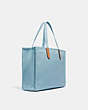 COACH®,TOTE 42 IN 100 PERCENT RECYCLED CANVAS,Recycled Canvas,Large,Brass/Celestial Blue,Angle View