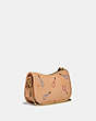 COACH®,SWINGER 20 IN ORIGINAL NATURAL LEATHER,Original Natural Leather,Small,Brass/BUFF,Angle View