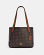 COACH®,TOTE 27 WITH HORSE AND CARRIAGE DOT PRINT,Canvas/Smooth Leather,Medium,Gold/Black,Front View