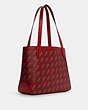COACH®,TOTE WITH HORSE AND CARRIAGE DOT PRINT,Canvas/Smooth Leather,Large,Gold/1941 Red,Angle View