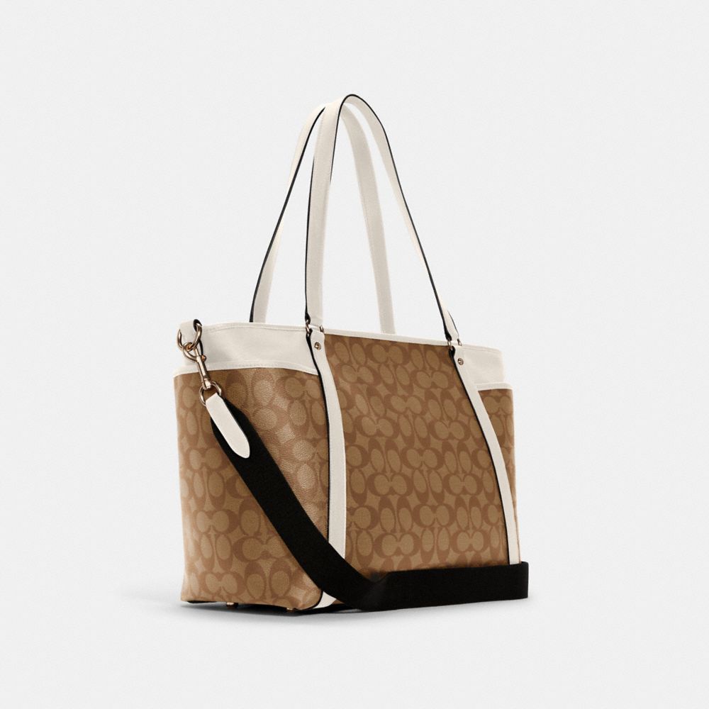 Coach Outlet Baby Bag in Signature Canvas - Beige
