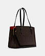 COACH®,TATUM CARRYALL IN SIGNATURE CANVAS,Signature Coated Canvas/Smooth Leather,Large,Gold/Brown Black,Angle View