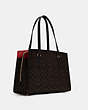 COACH®,TATUM CARRYALL 40 IN SIGNATURE CANVAS,n/a,X-Large,Gold/Brown Black,Angle View