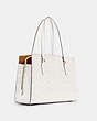COACH®,TATUM CARRYALL 40 IN SIGNATURE CANVAS,n/a,Large,Gold/Chalk/Glacierwhite,Angle View