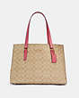 COACH®,TATUM CARRYALL 40 IN SIGNATURE CANVAS,n/a,X-Large,Gold/Light Khaki/Confetti Pink,Front View