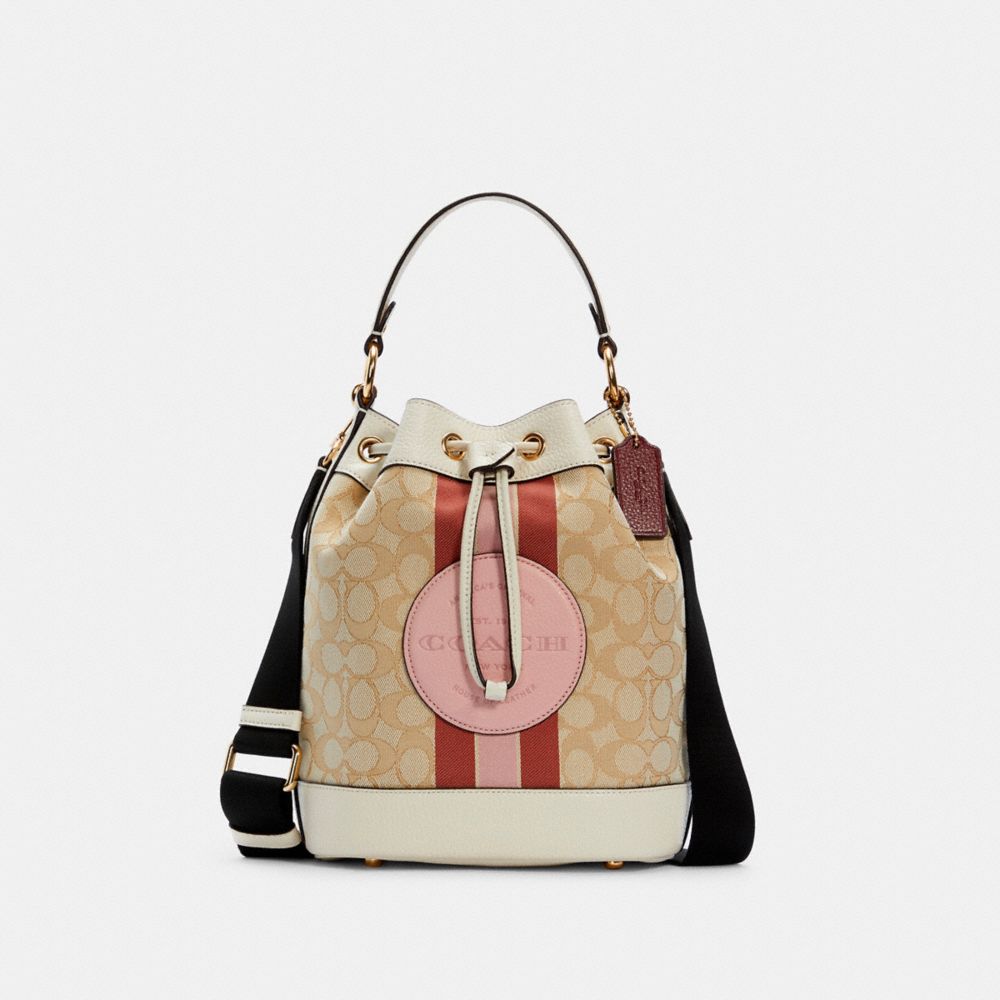 COACH®,DEMPSEY DRAWSTRING BUCKET BAG IN SIGNATURE JACQUARD WITH STRIPE AND COACH PATCH,Jacquard,Medium,Gold/Lt Khaki/Powder Pink Multi,Front View