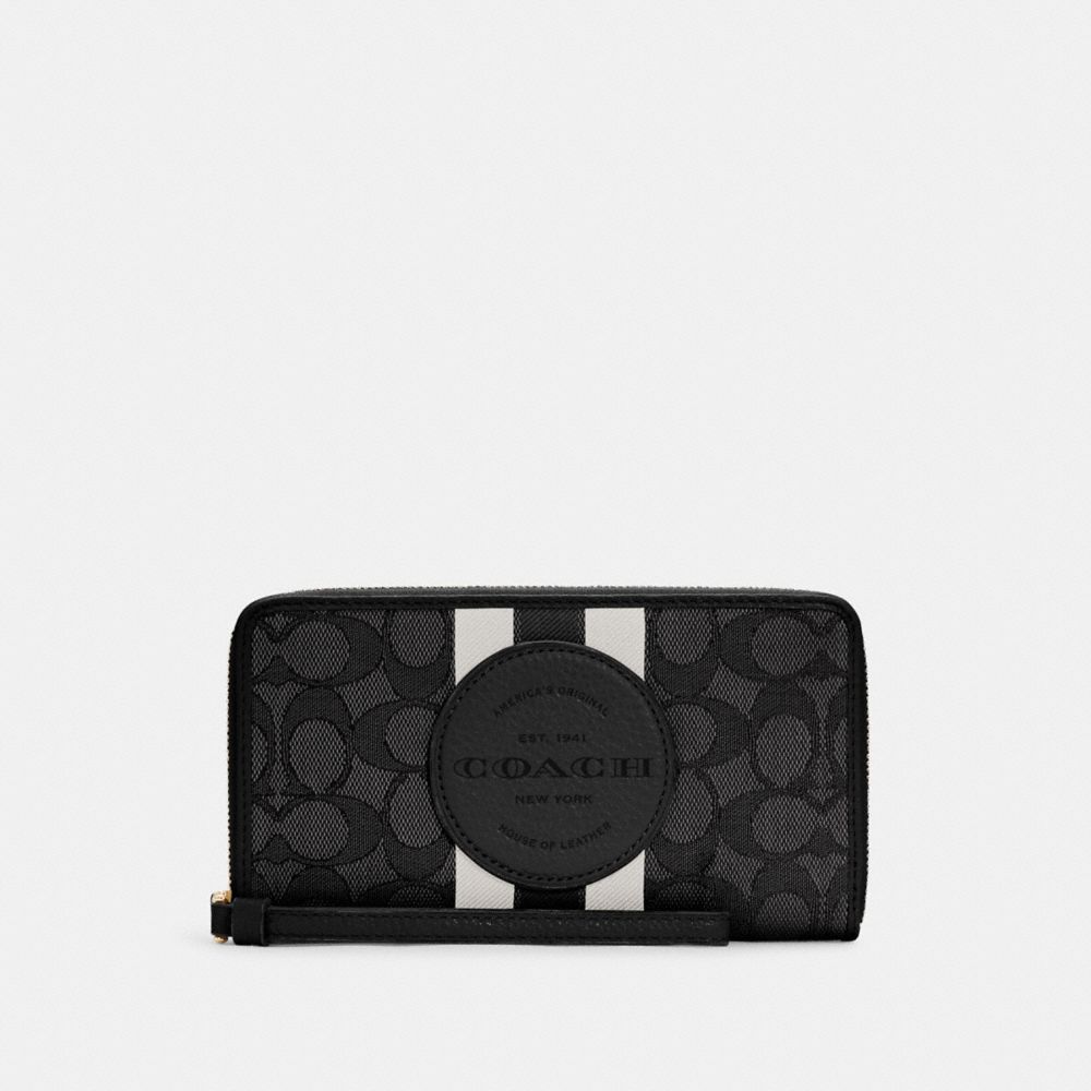 COACH®  Dempsey Large Phone Wallet With Houndstooth Print And Patch