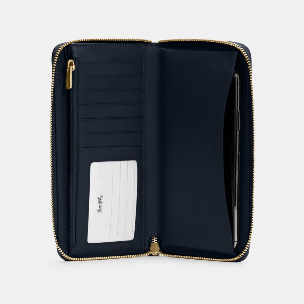 Spacious women's black wallet with gold zipper