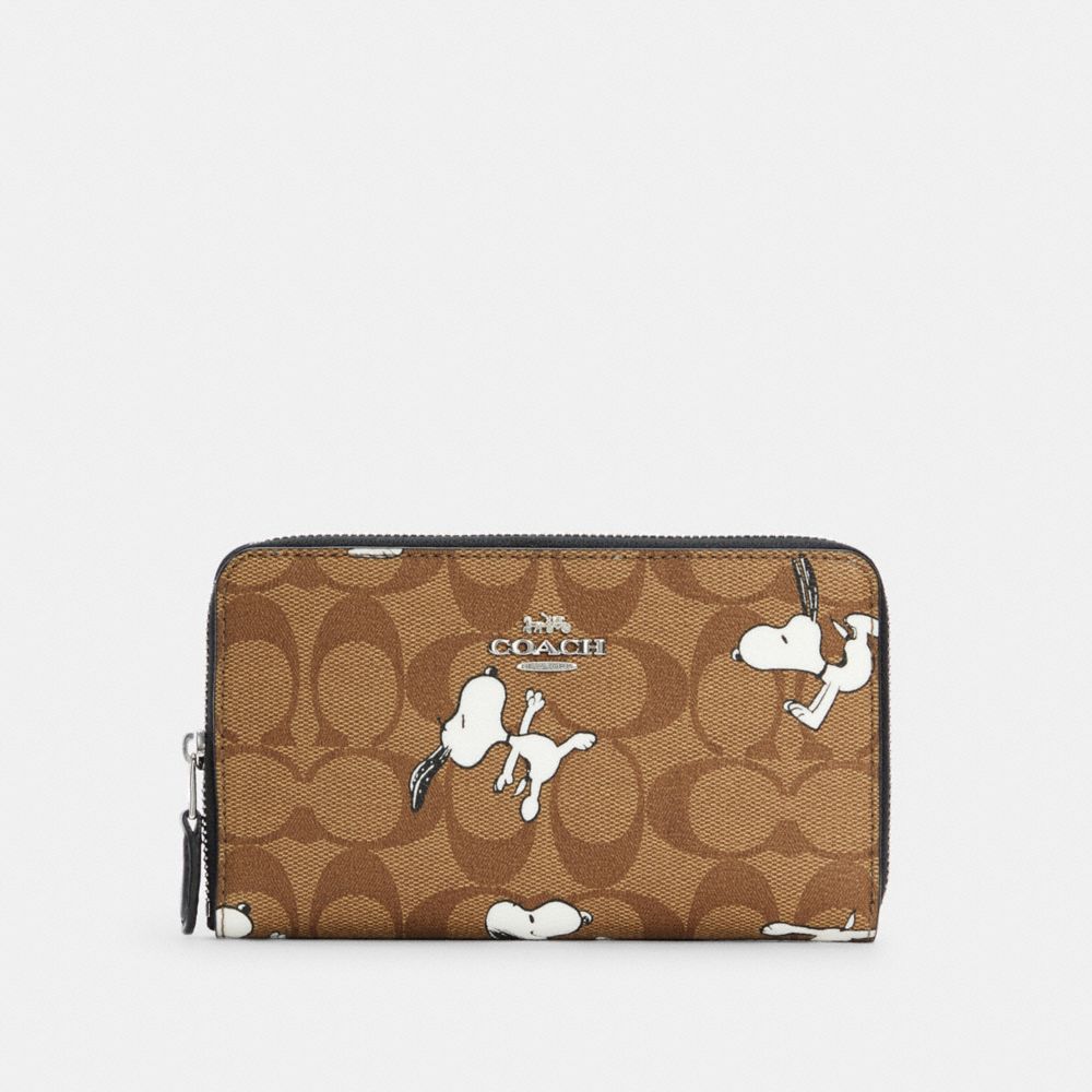 COACH®  Coach X Peanuts Round Coin Case In Signature Canvas With Snoopy  Presents Print