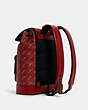 COACH®,TURNER BACKPACK WITH HORSE AND CARRIAGE DOT PRINT,Leather,X-Large,Gunmetal/Bright Red 1941 Red,Angle View