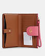 COACH®,PHONE WALLET IN COLORBLOCK WITH STRIPE,Gold/Confetti Pink Mango Multi,Inside View,Top View