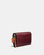 COACH®,TABBY CHAIN CLUTCH IN COLORBLOCK WITH SNAKESKIN DETAIL,Pebble Leather/Smooth Leather/Exotic,Mini,Brass/Wine Multi,Angle View