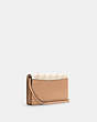 COACH®,ANNA FOLDOVER CROSSBODY CLUTCH WITH HORSE AND CARRIAGE DOT PRINT,Mini,Gold/Cream,Angle View