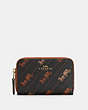 COACH®,ZIP AROUND COIN CASE WITH HORSE AND CARRIAGE DOT PRINT,pvc,Gold/Black,Front View