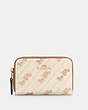 COACH®,ZIP AROUND COIN CASE WITH HORSE AND CARRIAGE DOT PRINT,pvc,Gold/Cream,Front View