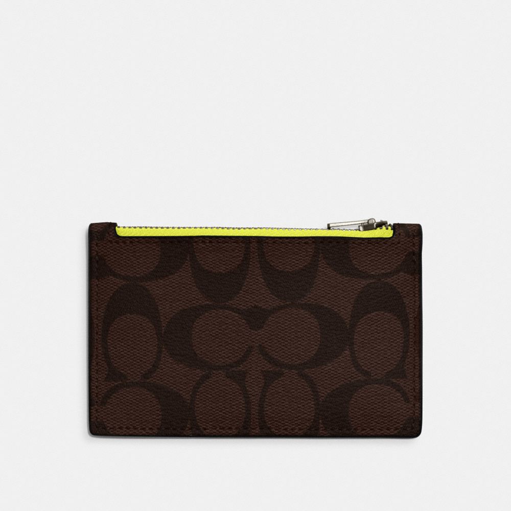 COACH®,ZIP CARD CASE IN SIGNATURE CANVAS,Signature Canvas,Black Antique Nickel/Mahogany/Bright Yellow,Front View image number 0