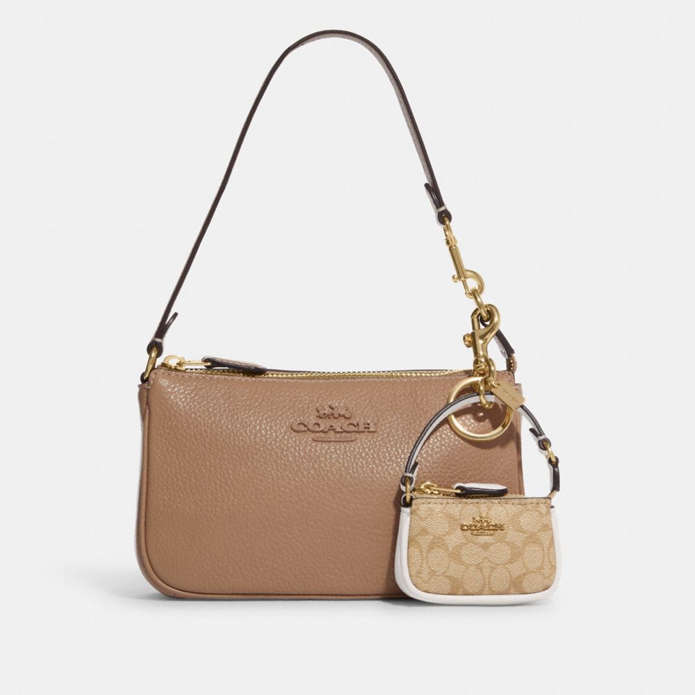 Coach Outlet Women's Mini Saddle Bag Charm In Signature Canvas - Gold/light Khaki Multi