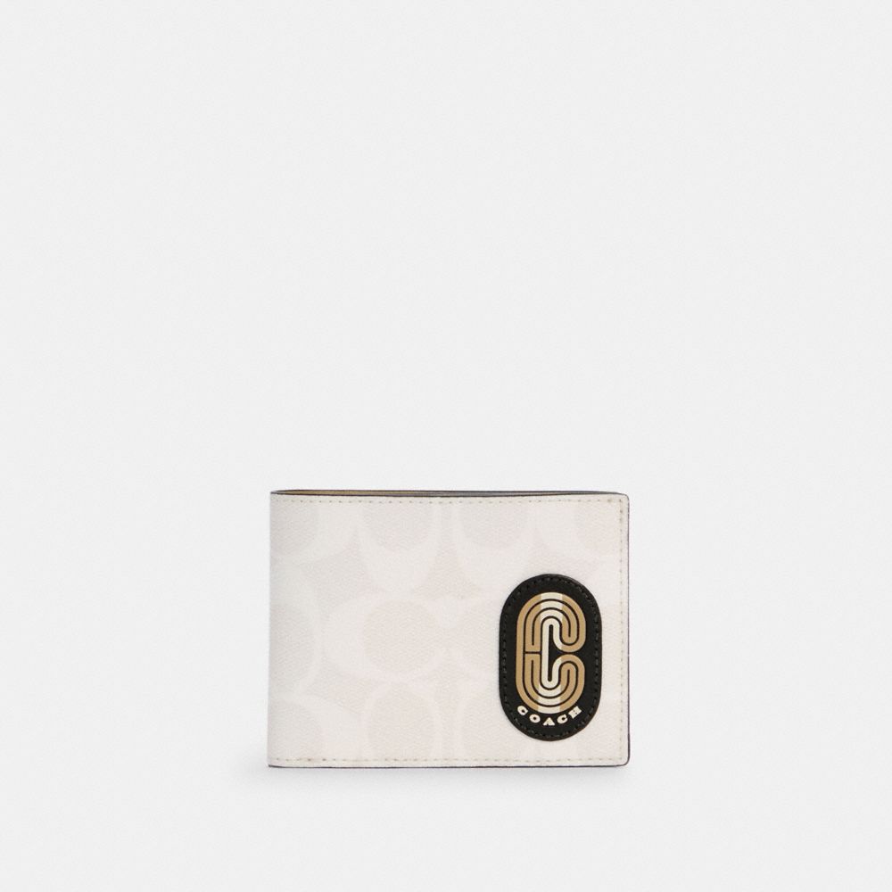 Slim billfold wallet in signature canvas with coach patch new arrivals