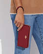 COACH®,LONG ZIP AROUND WALLET,Pebbled Leather,Mini,Gold/Cherry,Detail View