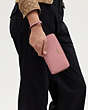 COACH®,LONG ZIP AROUND WALLET,Pebbled Leather,Mini,Gold/True Pink,Detail View