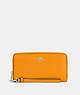 COACH®,LONG ZIP AROUND WALLET,Pebbled Leather,Silver/Papaya,Front View