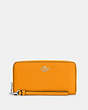 COACH®,LONG ZIP AROUND WALLET,Pebbled Leather,Mini,Silver/Papaya,Front View