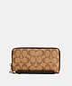 COACH®,LONG ZIP AROUND WALLET IN SIGNATURE CANVAS,pvc,Small,Gold/Khaki/Black,Front View
