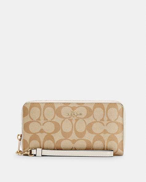 COACH®,LONG ZIP AROUND WALLET IN SIGNATURE CANVAS,pvc,Small,Gold/Light Khaki Chalk,Front View