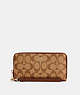 COACH®,LONG ZIP AROUND WALLET IN SIGNATURE CANVAS,pvc,Small,Gold/Khaki Saddle 2,Front View