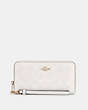 COACH®,LONG ZIP AROUND WALLET IN SIGNATURE CANVAS,pvc,Small,Gold/Chalk/Glacierwhite,Front View