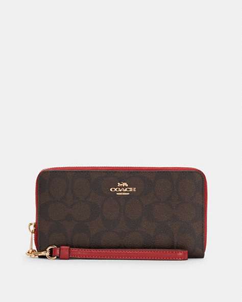COACH®,LONG ZIP AROUND WALLET IN SIGNATURE CANVAS,pvc,Gold/Brown 1941 Red,Front View