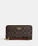 COACH®,LONG ZIP AROUND WALLET IN SIGNATURE CANVAS,pvc,Mini,Im/Brown/Redwood,Front View