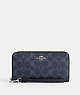 COACH®,LONG ZIP AROUND WALLET IN SIGNATURE CANVAS,pvc,Small,Silver/Denim/Midnight Navy,Front View