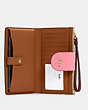 Phone Wallet In Colorblock Signature Canvas
