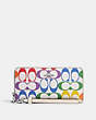 COACH®,LONG ZIP AROUND WALLET IN RAINBOW SIGNATURE CANVAS,pvc,Mini,Silver/Chalk Multi,Front View