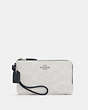 COACH®,DOUBLE CORNER ZIP WRISTLET IN COLORBLOCK SIGNATURE CANVAS,pvc,Silver/Waterfall Midnight Multi,Front View