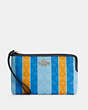 COACH®,LARGE CORNER ZIP WRISTLET IN SIGNATURE JACQUARD WITH STRIPES,Jacquard,Mini,Gold/Blue/Yellow Multi,Front View