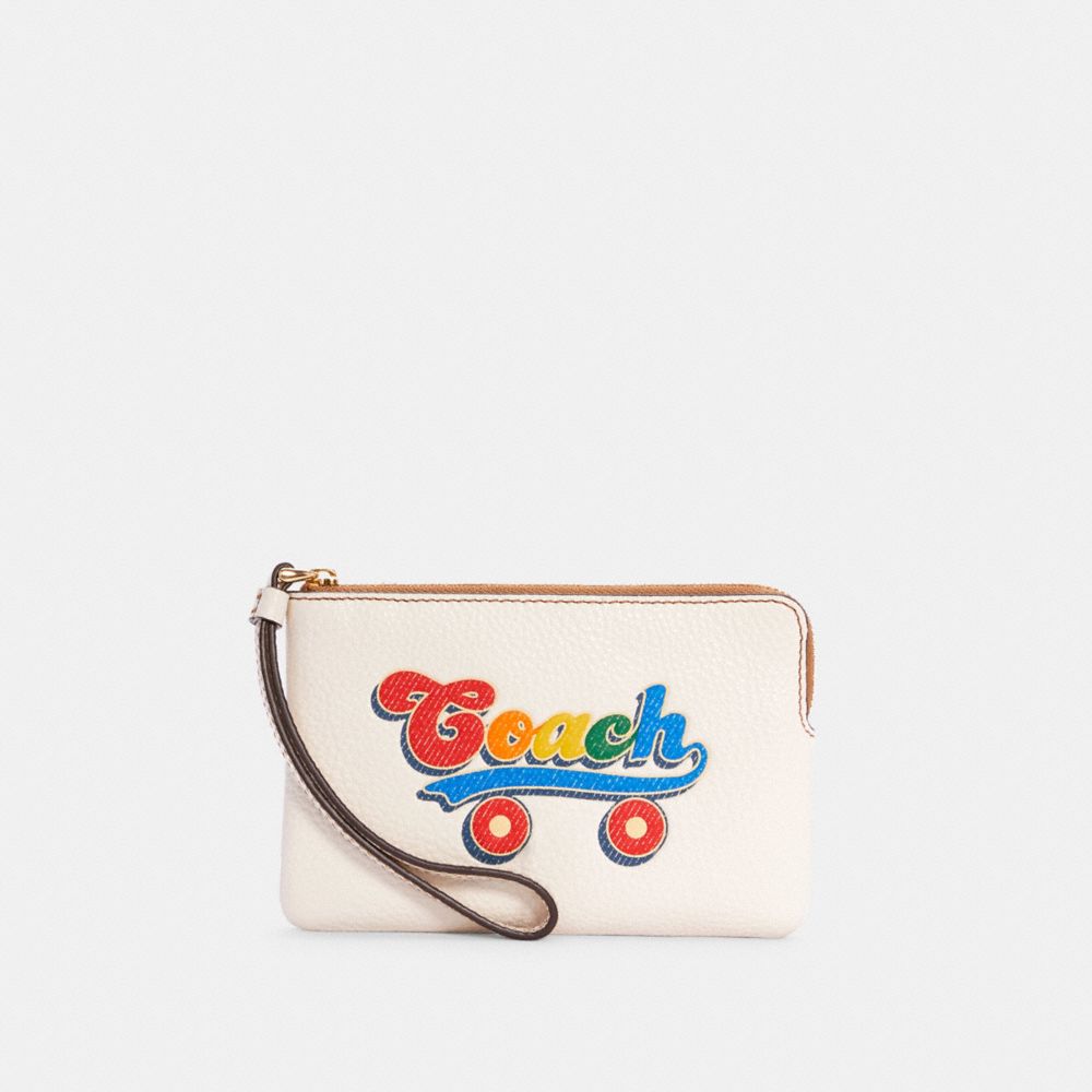 COACH®,CORNER ZIP WRISTLET WITH RAINBOW ROLLER SKATE GRAPHIC,Gold/Chalk Multi,Front View