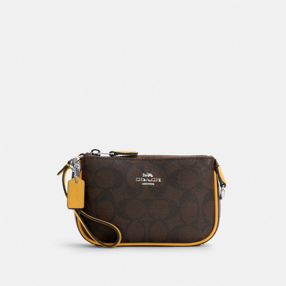 COACH®,Nolita 15 In Signature Canvas,,Front View