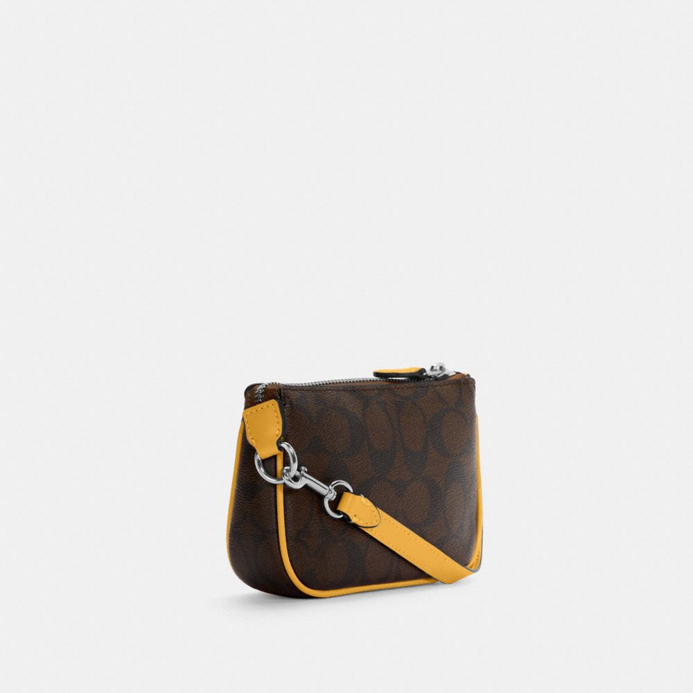 COACH®,Nolita 15 In Signature Canvas,,Angle View