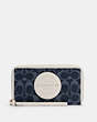 COACH®,DEMPSEY LARGE PHONE WALLET IN SIGNATURE DENIM WITH COACH PATCH,Gold/Denim Multi,Front View
