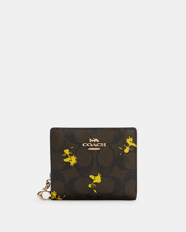 Coach X Peanuts Snap Wallet In Signature Canvas With Woodstock Print