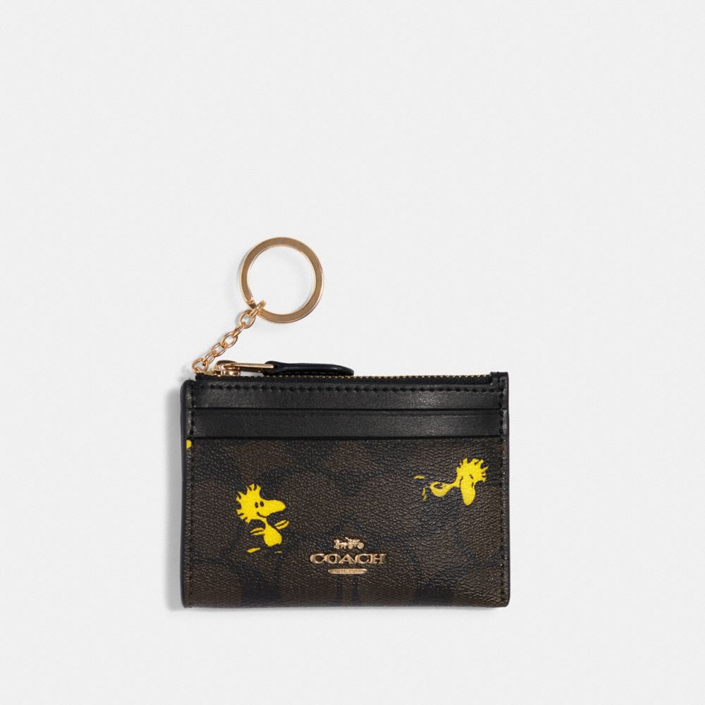 Coach X Peanuts Mini Skinny Id Case Small Wallet With Woodstock PrintC4594  Brown Size One Size - $63 (36% Off Retail) - From Emily